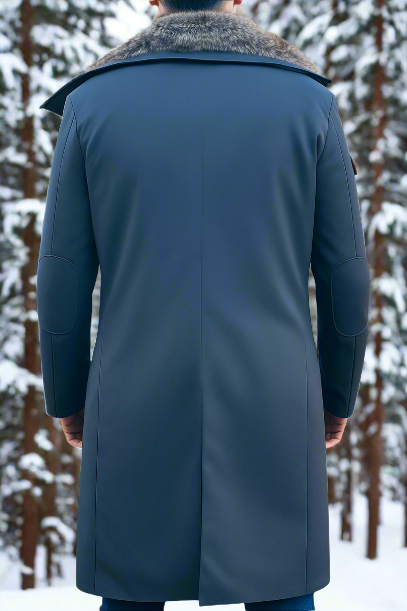 Person wearing a blue coat with fur collar in a snowy forest